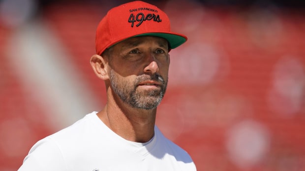 49ers head coach Kyle Shanahan looks on before a game.